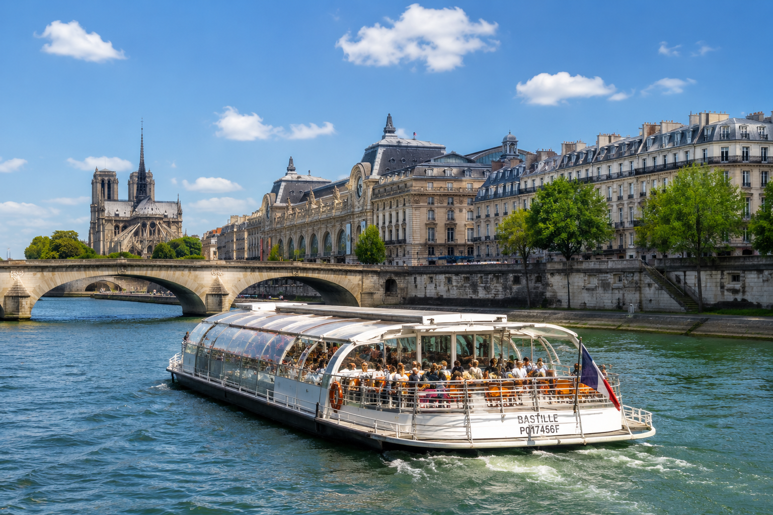 Seine River sightseeing cruise in Paris passing historic landmarks, bridges and riverside architecture.